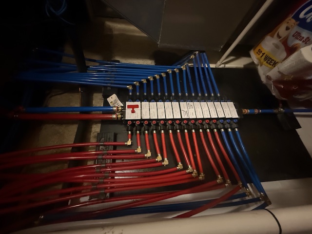 PEX manifold water distribution system