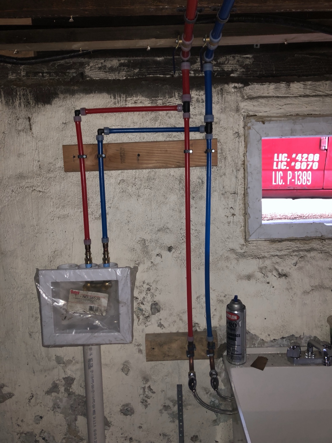 Laundry sink and supply piping